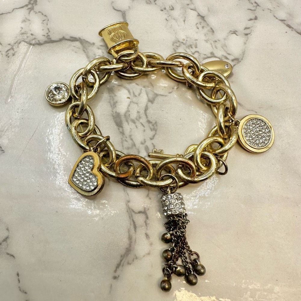 Jennifer Lopez gold tone  rhinestone charm bracelet